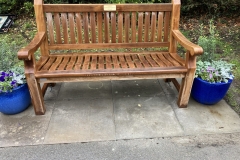 Bus stop bench with planters